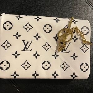 Louis Vuitton print cross body purse